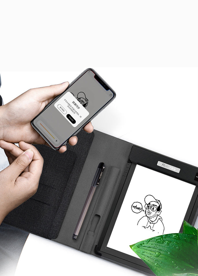 Smart notebook folio open with a stylus pen and a smartphone displaying app sync interface