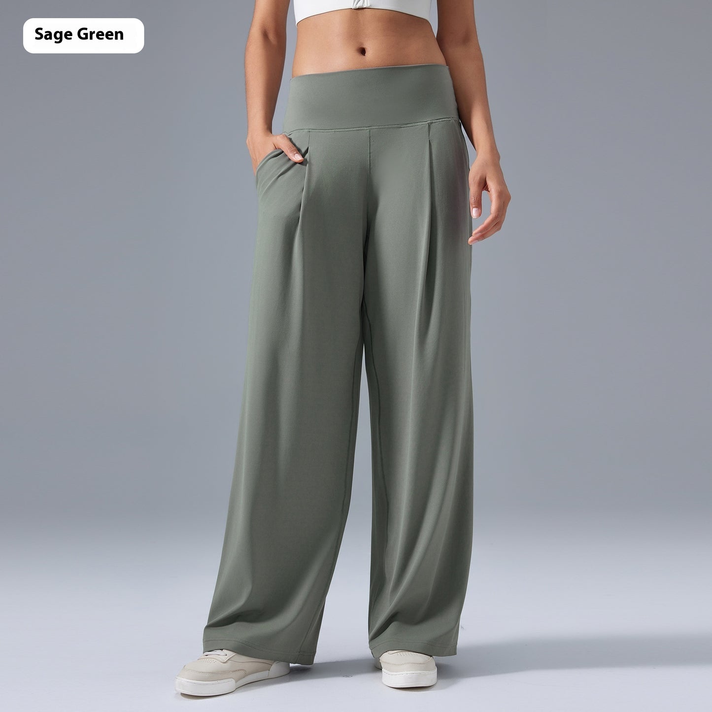 Sage green, high waist track pants with a flowy, loose fit design for daily wear.