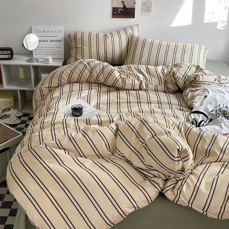 Beige striped brushed bedding set for a cozy bedroom.