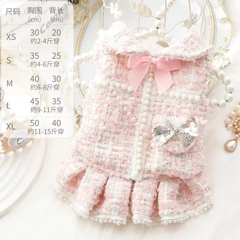 Pink plaid soft knit dog dress with pearl trim and bows for holiday pet wear.