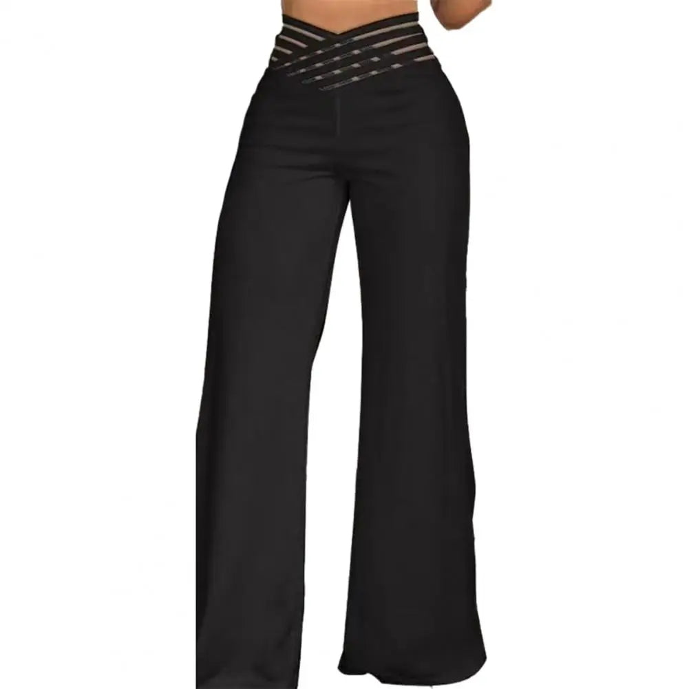 Black high waist knit pants with a crisscross mesh waistband for comfortable daily wear.