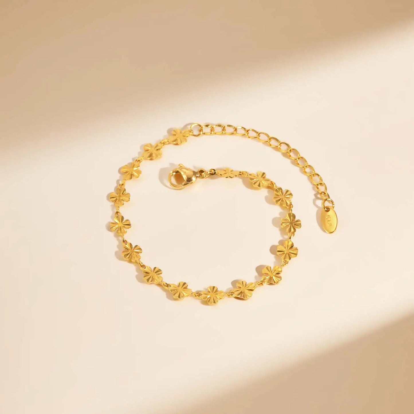 Elegant Four Leaf Clover Bracelet - Gold Plated Stainless Steel Flower Charm Bangle