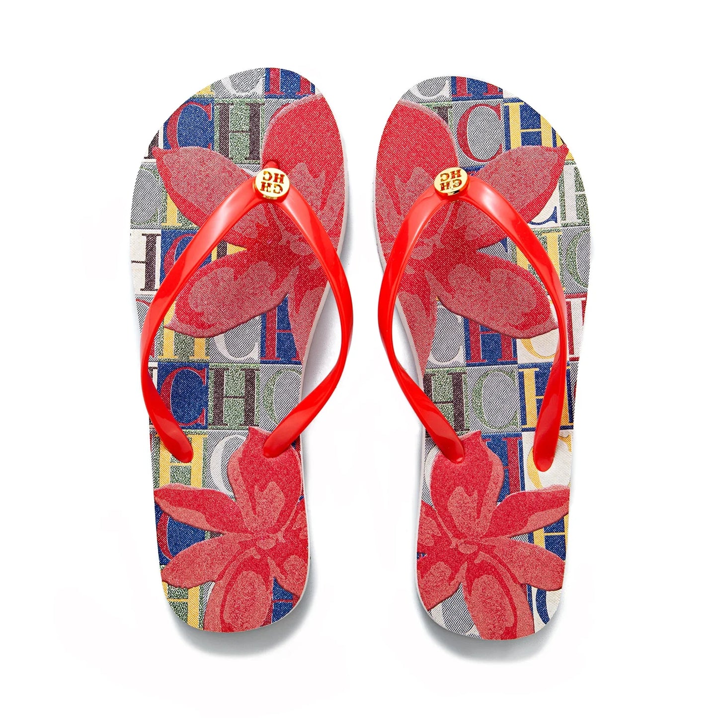 Red rubber non-slip flip-flops with floral pattern and logo print for indoor home wear.