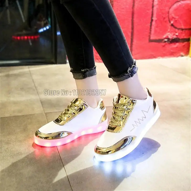 White and gold knit sneakers with light up LED soles for everyday wear.