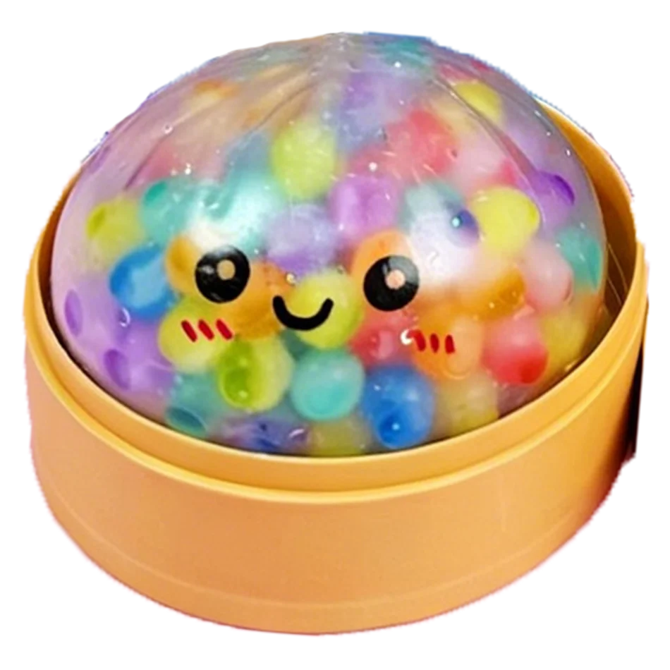 Clear, soft foam dumpling fidget toy with colorful beads and a smiling face in a yellow steamer for sensory play.