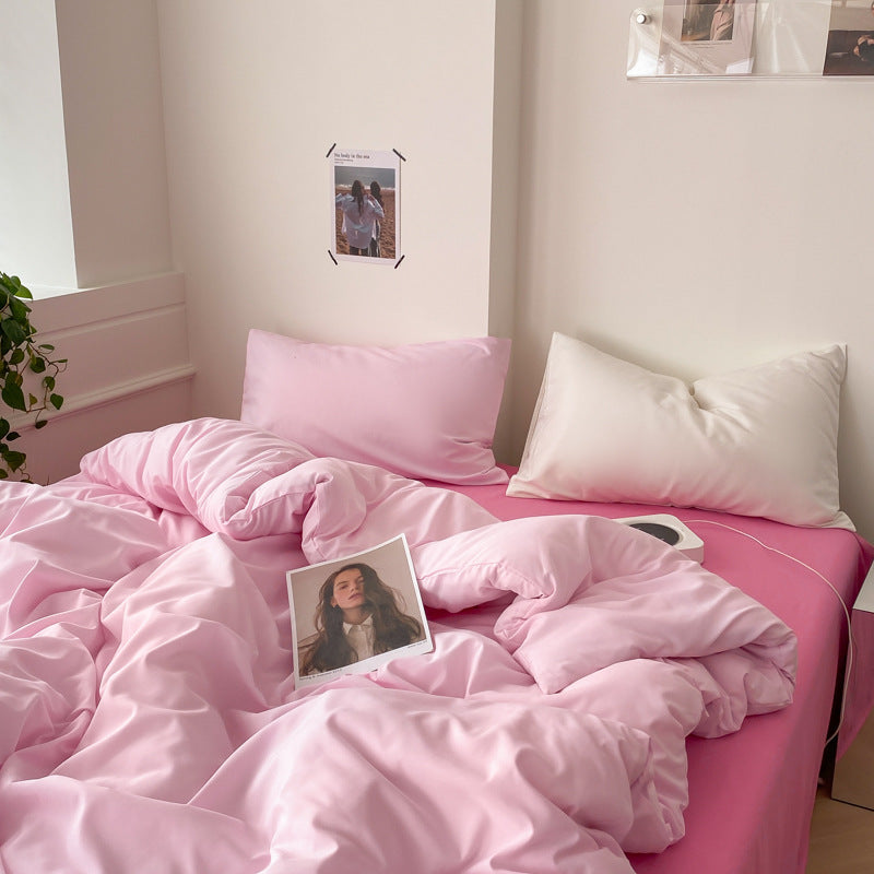 Pink and white soft cotton bedding set with a duvet cover for a comfortable sleep.