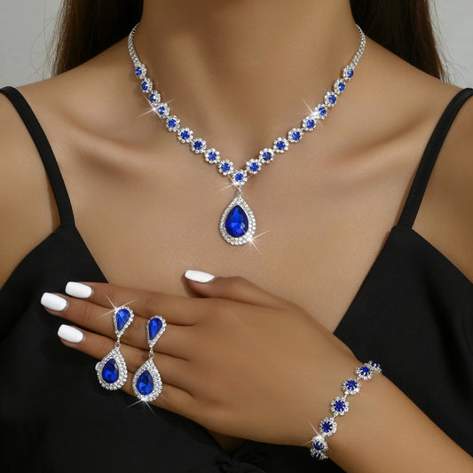 three-piece bridal jewelry set with necklace earrings and bracelet, detail view
