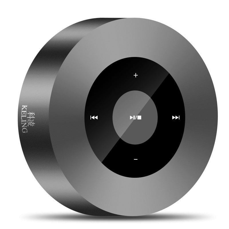 Round dark gray Bluetooth speaker with central control panel and playback buttons.