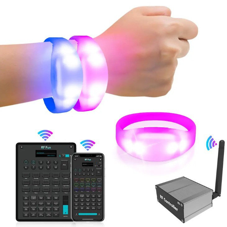 Two glowing LED wristbands on a wrist next to a controller, smartphone app, and RF transmitter.