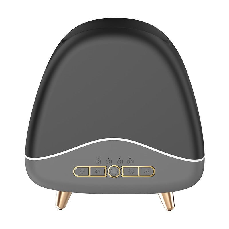 Flame aroma diffuser in a dark finish with timer buttons and gold feet