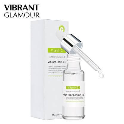 Vitamin C facial serum bottle with dropper and matching white box packaging.