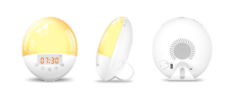Three views of a round white sunrise wake-up light alarm clock showing front digital display, side profile, and back ports.