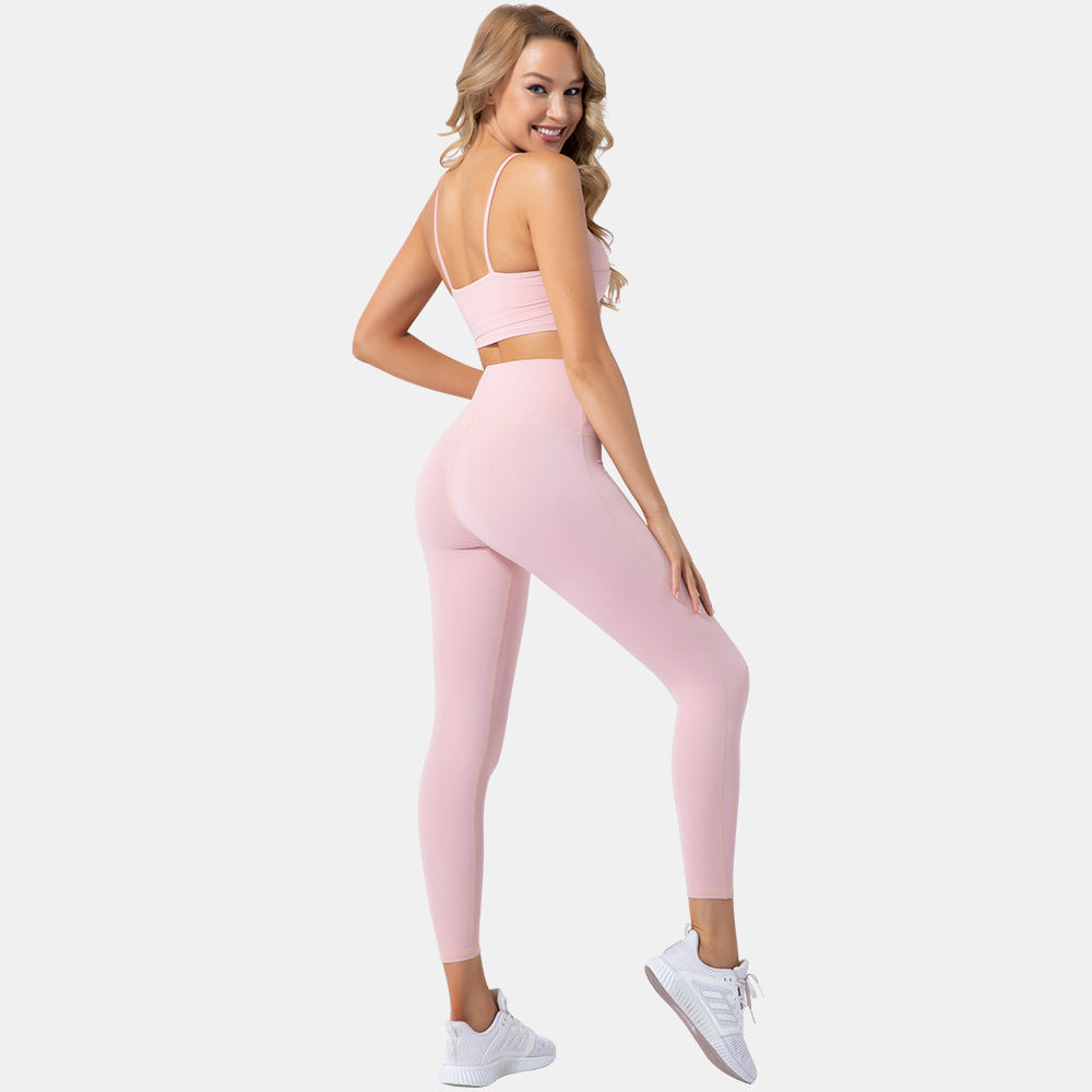 Light pink seamless high waist yoga set for studio and gym workouts.