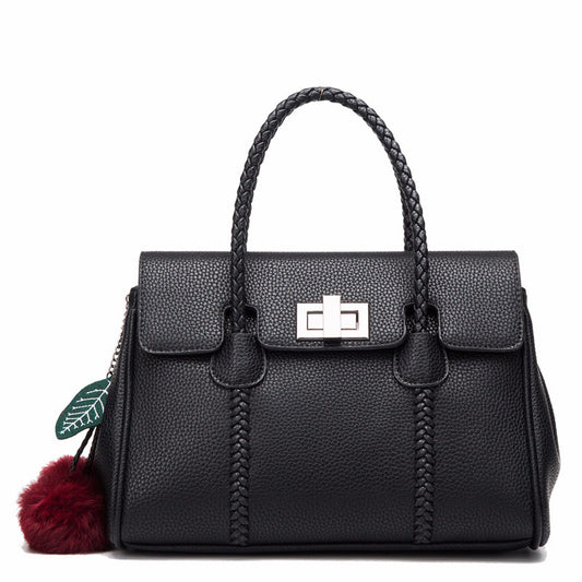 Black textured leather handbag with braided top handles and metal turn lock closure
