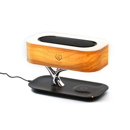 Wood-grain rectangular table lamp with chrome tree base and black charging platform.