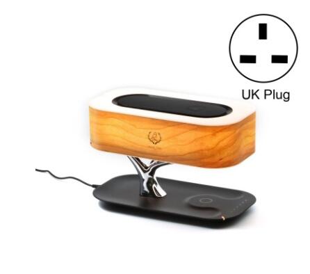 Wooden tree table lamp with silver branch base, black charging pad, and UK plug icon insert