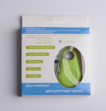 Green, oval-shaped Bluetooth tracker in retail packaging for locating keys and bags.