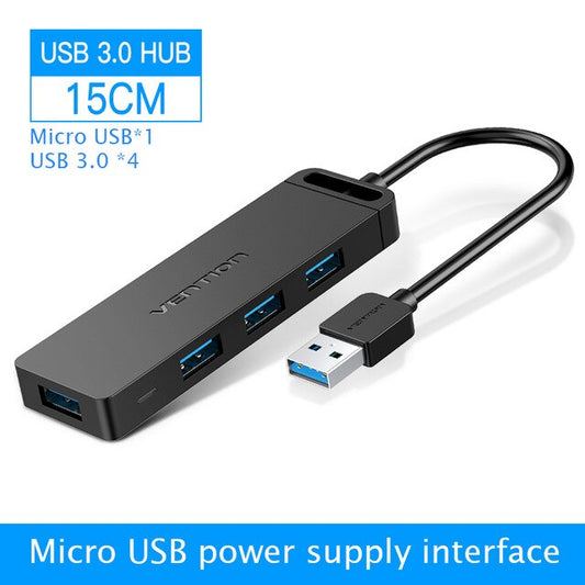 Black USB 3.0 hub with four ports and an attached cable with a USB connector.