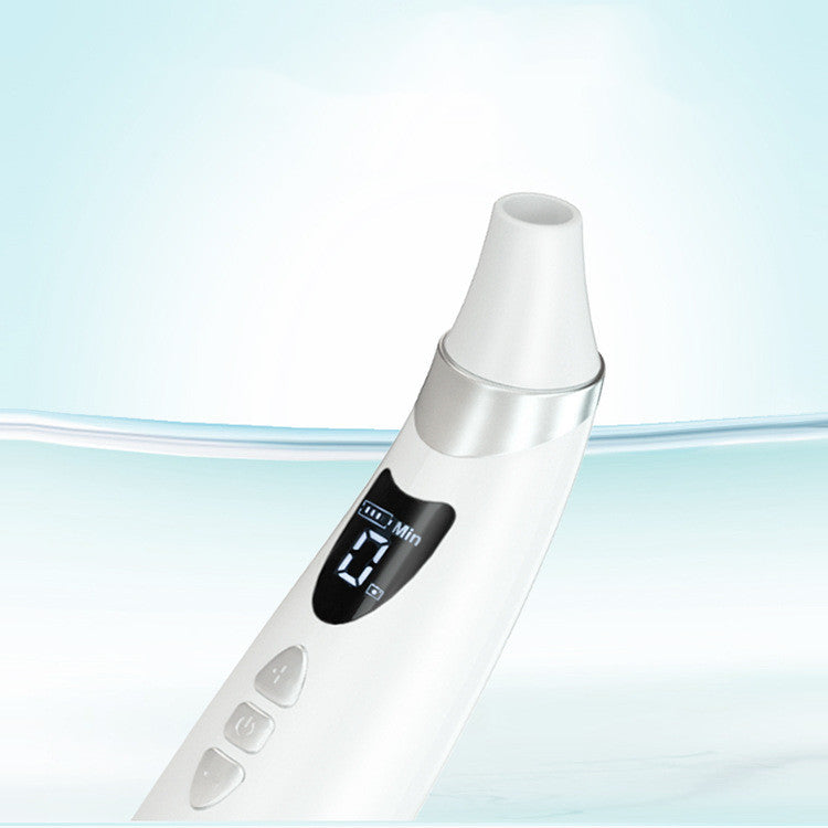 Close-up of blackhead remover tip with digital display