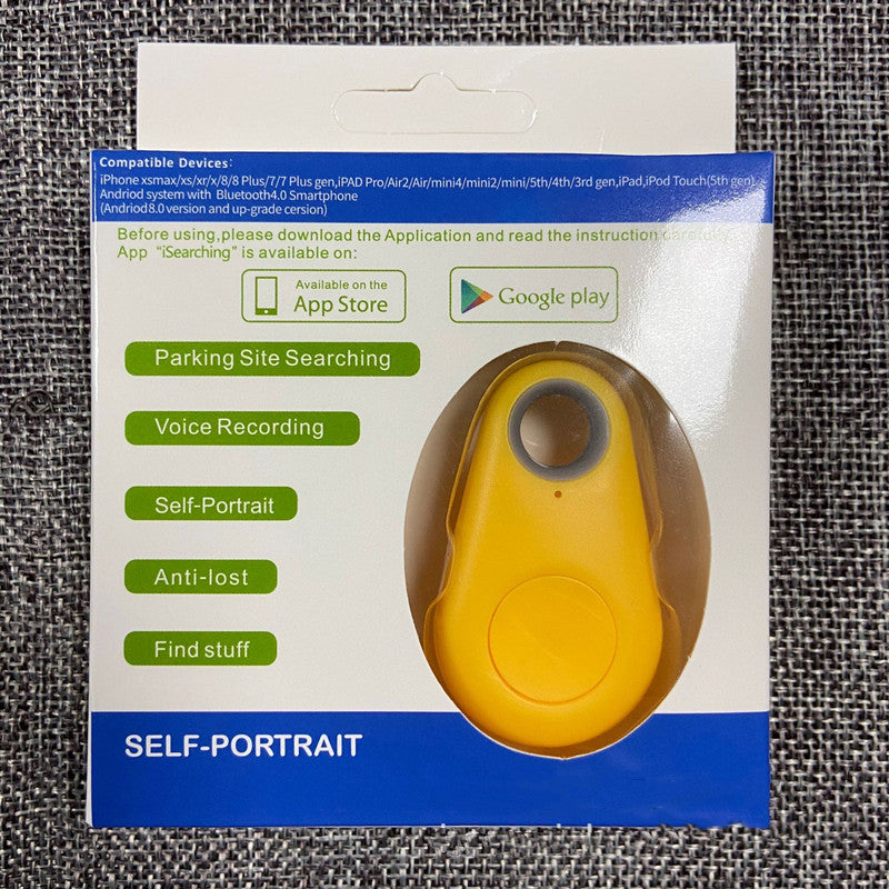Yellow teardrop-shaped Bluetooth tracker in retail packaging for locating keys and bags.