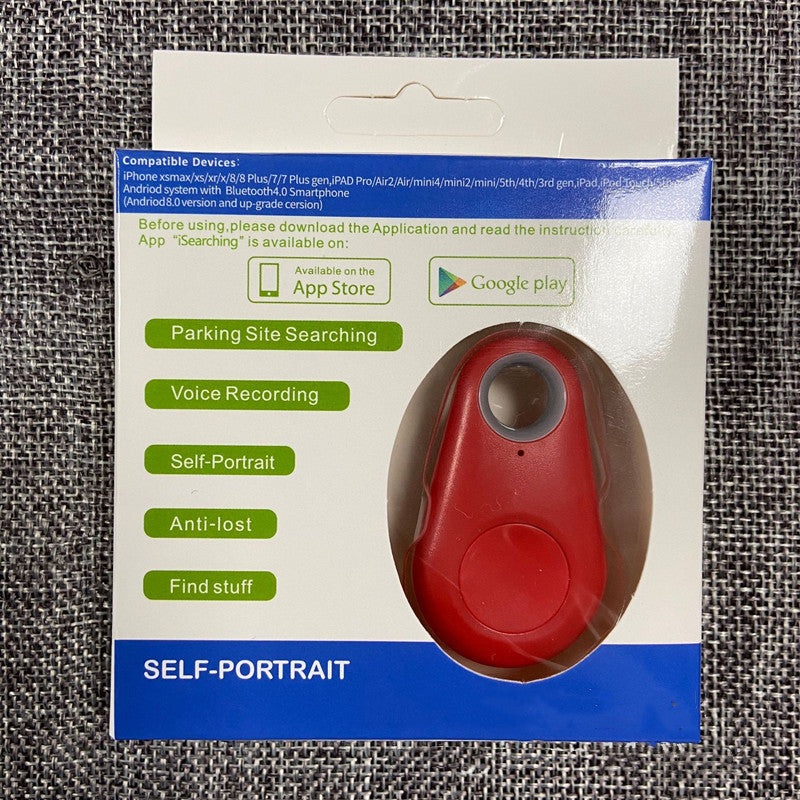 Red, teardrop-shaped waterproof bluetooth tracker for keys and bags in retail packaging.