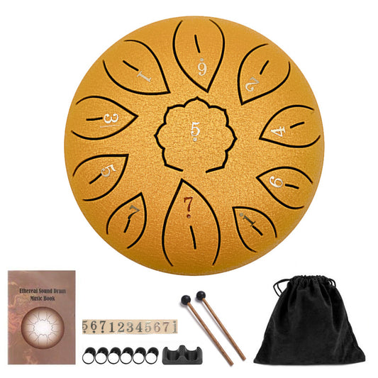 Yellow steel tongue drum with numbered petals, plus mallets, finger picks, music book, and a black drawstring bag.