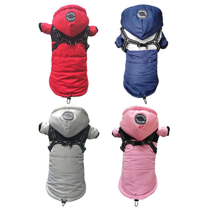 Four hooded puffer dog coats in red, blue, grey, and pink with integrated harnesses.