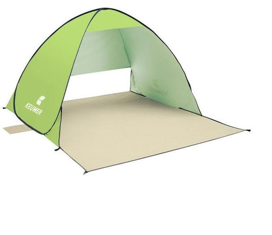 Light green pop-up beach tent with beige extended floor mat against white background.