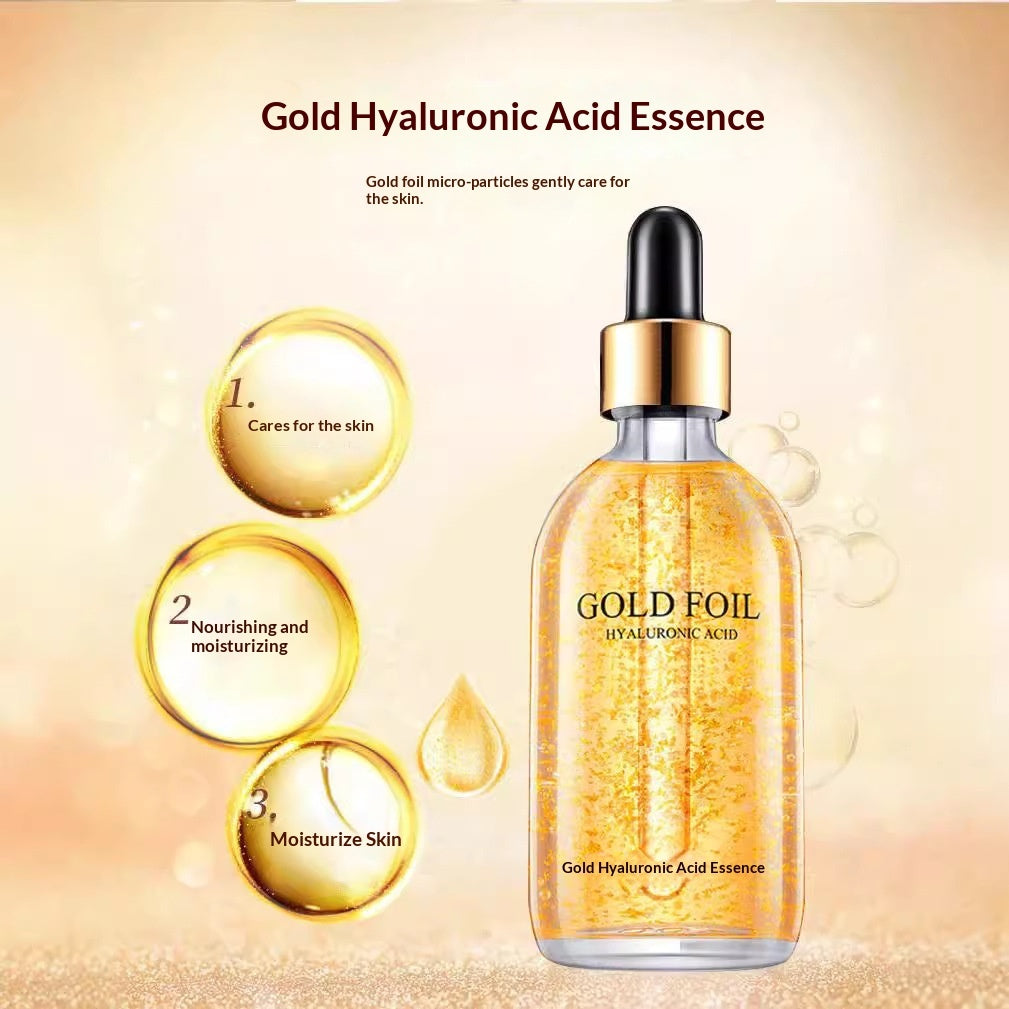 Gold foil hyaluronic essence bottle with golden droplet designs