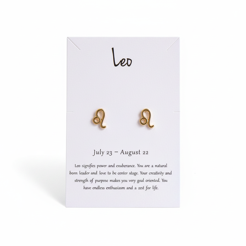 Gold Leo zodiac sign stud earrings on white paper display card.