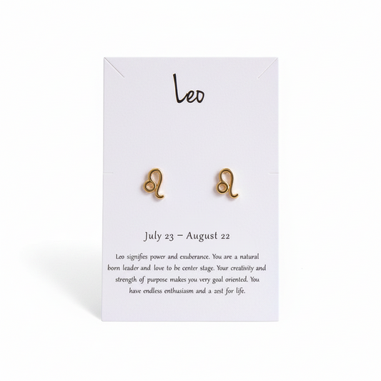 Gold Leo zodiac symbol stud earrings on a display card.