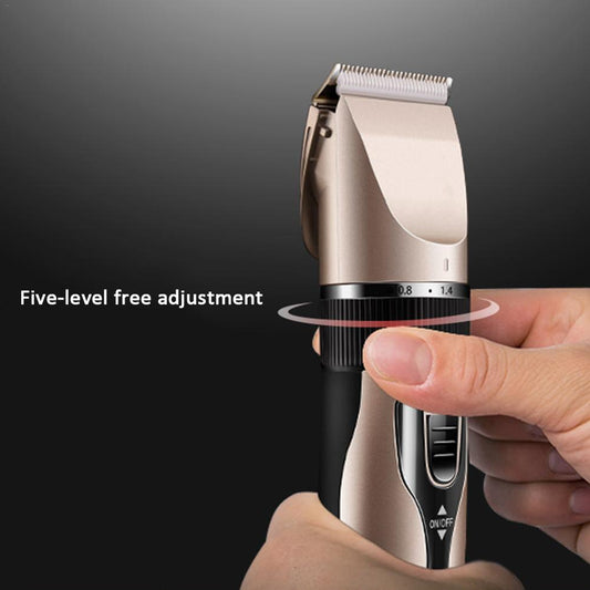 Hand holding a cordless pet grooming clipper, showing the adjustable blade dial and on off switch.