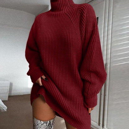 Deep red ribbed knit sweater dress with a high turtleneck and relaxed fit for casual winter styling.