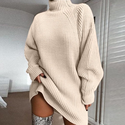 Beige ribbed knit turtleneck sweater dress with a relaxed fit for casual winter wear.