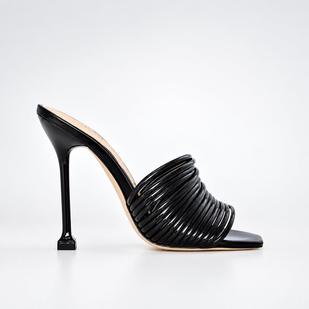 ribbed-strap stiletto mules with flared heel and square toe, close-up view