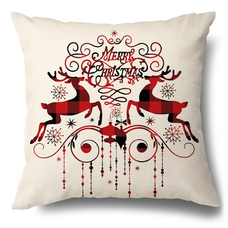 Beige pillow cover featuring red and black buffalo plaid reindeer and Merry Christmas text with ornaments.