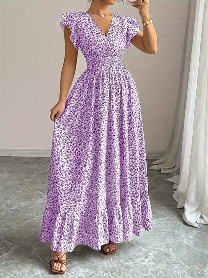 Lavender floral flowy polyester dress with ruffle sleeves, a V-neck, and smocked waist for resortwear.