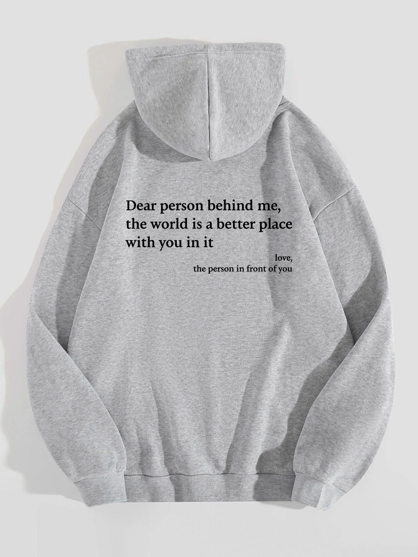 Grey oversized hooded sweatshirt with black letter print on back for daily wear.