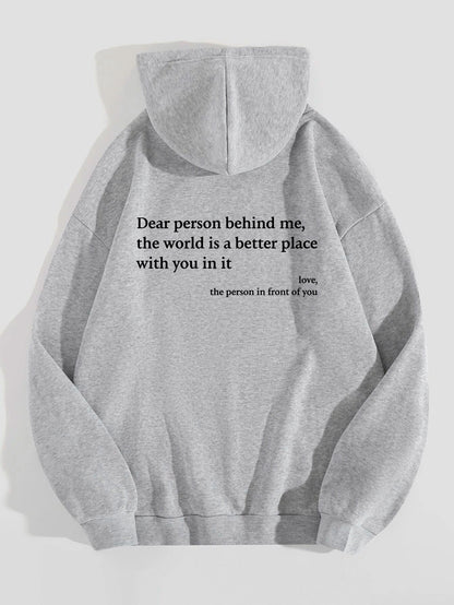 Grey oversized hooded sweatshirt with black letter print on back for daily wear.