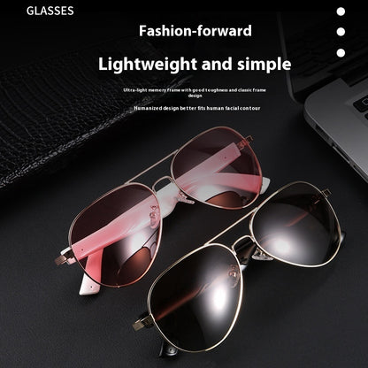Two pairs of gold, lightweight smart wearables with polarized lenses for real-time translation during travel.