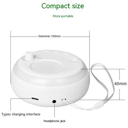 White noise sound machine showing dimensions of 100mm diameter and 40mm height with a wrist strap and control knob