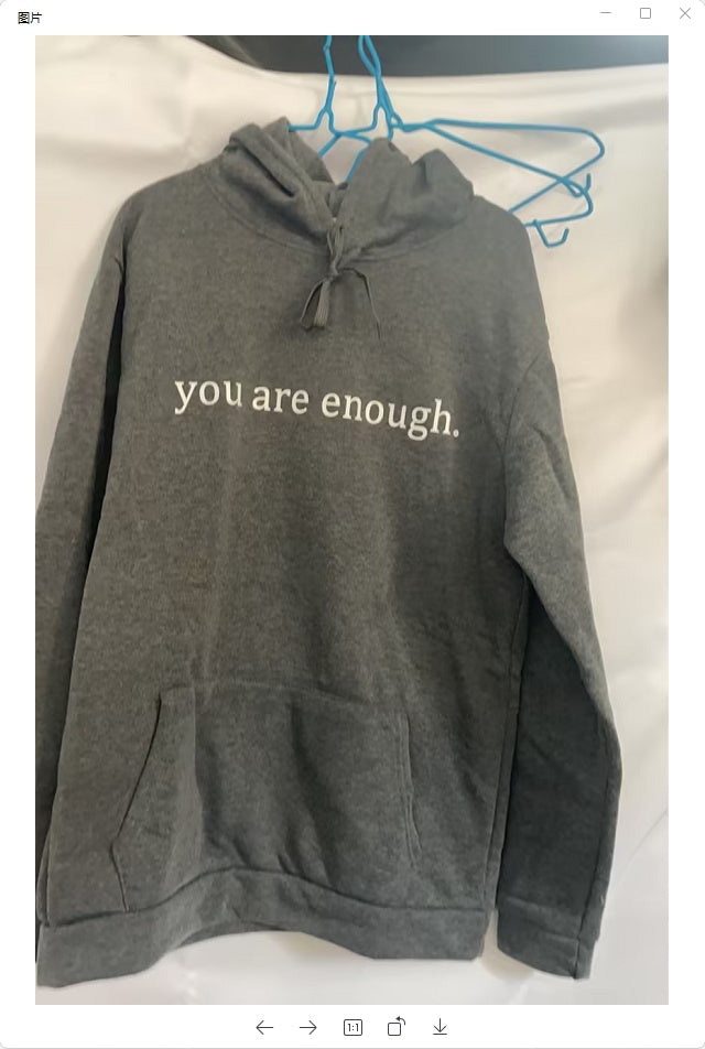 Grey hooded sweatshirt with white letter print, kangaroo pocket, and stretchy fabric for daily comfort.