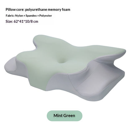 Mint green and gray ergonomic contour memory foam neck support pillow.