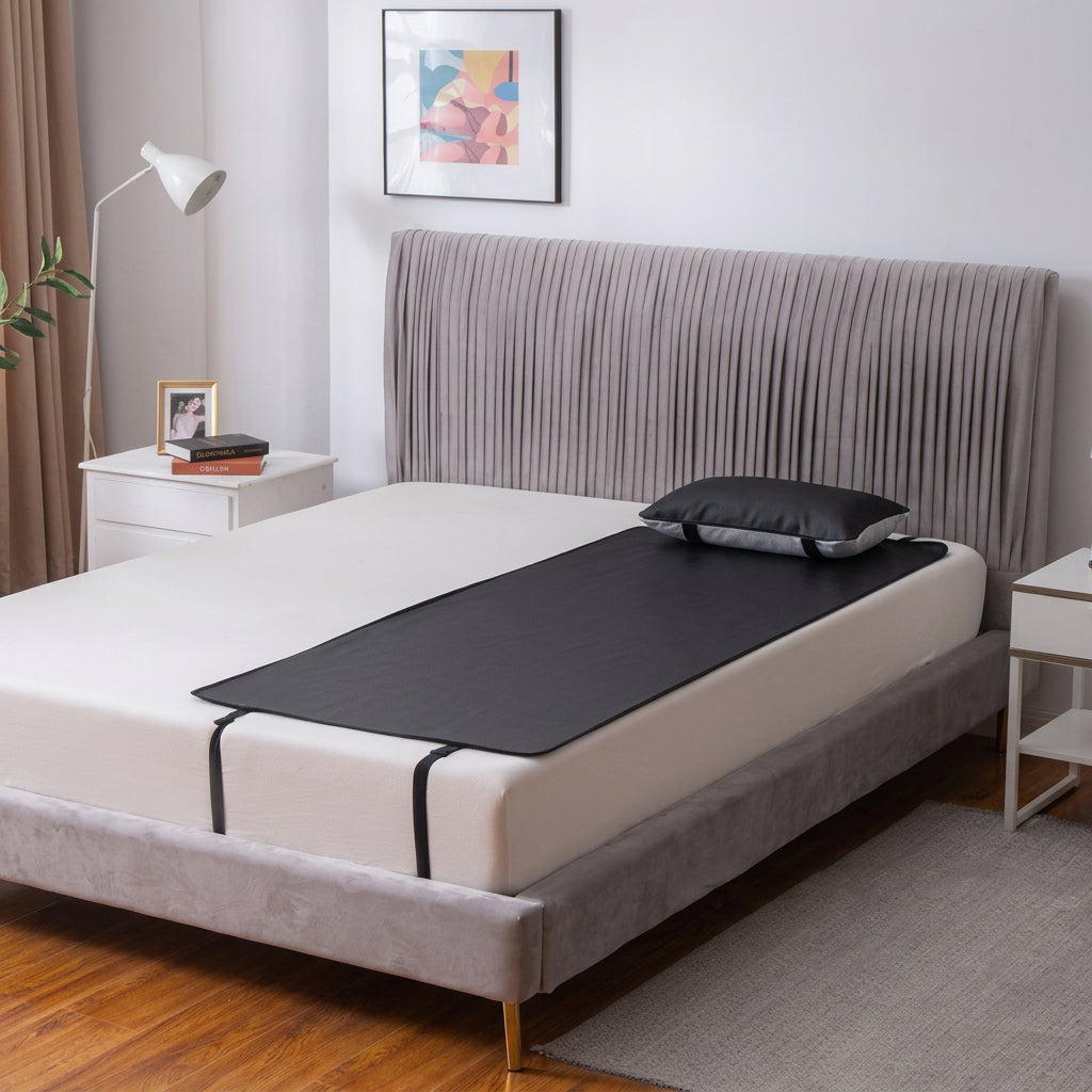 Grounding earthing bed mat in the narrow size laid along one side of a mattress