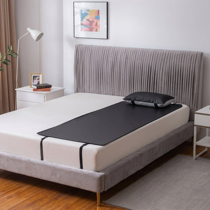 Grounding earthing bed mat in the narrow size laid along one side of a mattress