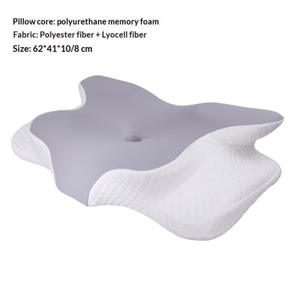 Ergonomic contour neck support pillow with grey top and white quilted sides.