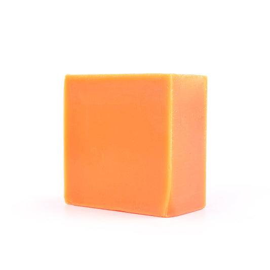 Orange rectangular bar soap on a white background
