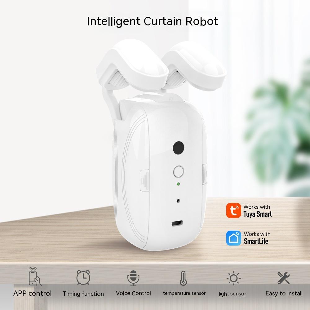 White smart curtain robot with dual motorized drive wheels and sensors standing on a wooden surface.