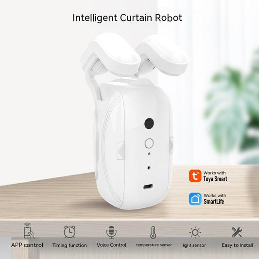 White smart curtain robot with dual motorized drive wheels and sensors standing on a wooden surface.