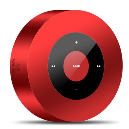 Round red bluetooth speaker with a central black control panel featuring playback buttons.